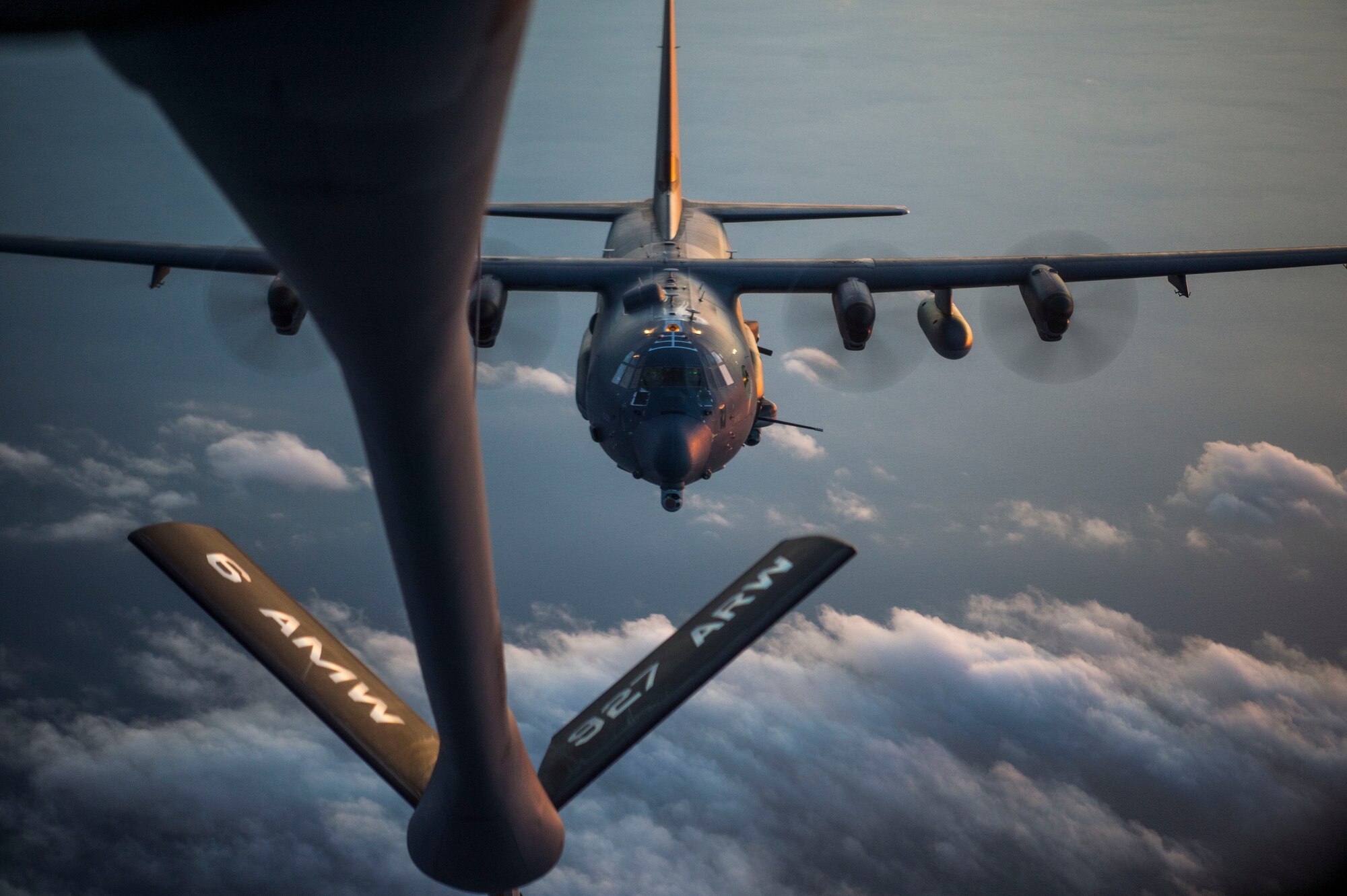 An AC-130 gunship closes in to receive fuel from a KC-135 Stratotanker assigned to the 6th Air Mobility Wing during Exercise Emerald Warrior, Jan. 17, 2019.