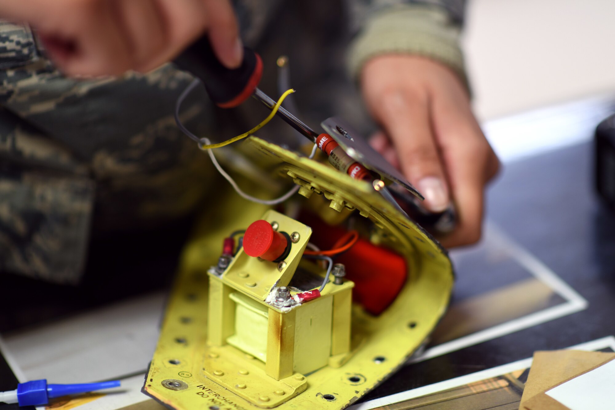 An Airman assigned to the 48th Component Maintenance Squadron’s Electrical and Environmental section reassembles an F-15’s wing tip light after repairing the power supply at Royal Air Force Lakenheath, England, Jan. 23, 2019. Throughout the month, several dozen components are broken down, repaired and reassembled by the backshop. (U.S. Air Force photo by Senior Airman Malcolm Mayfield)