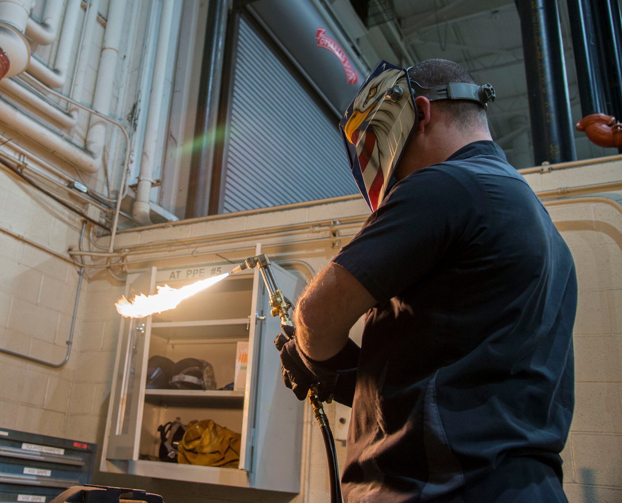 Tech Sgt. Brian Bradley, 375th Logistics Readiness Squadron vehicle maintenance technician, fires up the blowtorch in the fabrication workshop Jan. 10, 2019, at Scott Air Force Base, Ill. The vehicle maintenance flight use blowtorches to repair vehicles that are used for various missions around base.