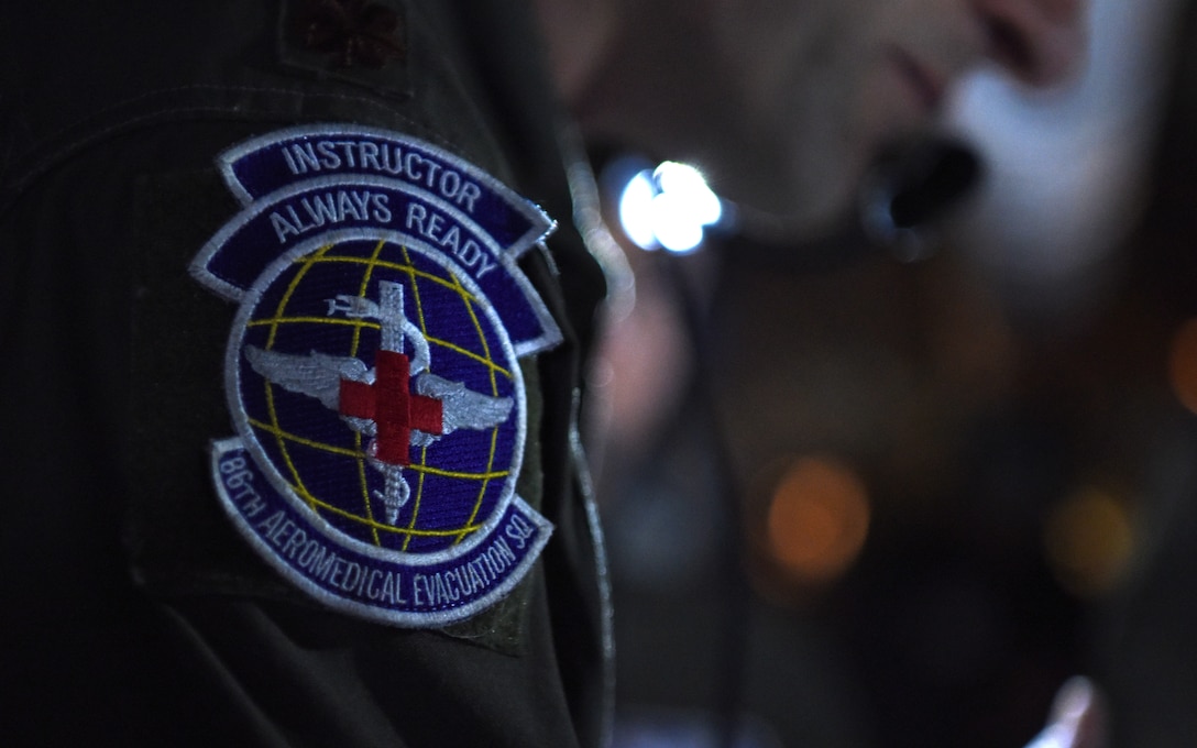 Members of the 86th Aeromedical Evacuation Squadron from Ramstein Air Base, Germany, perform medical evacuation training aboard a KC-135 Stratotanker over the skies of Germany, Jan. 23, 2019.  The 86th AES are charged with providing aeromedical care for both U.S. European Command and U.S. Africa Command, which is the largest area of responsibility out of all existing aeromedical evacuation squadrons. (U.S. Air Force photo by Airman 1st Class Brandon Esau
