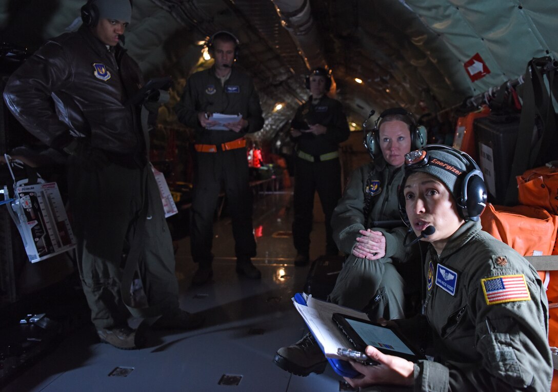 U.S. Maj. Mario Rocio Vazquez, 86th Aeromedical Evacuation Squadron medical crew director from Ramstein Air Base, Germany, provides a pre-flight brief prior to training aboard a KC-135 Stratotanker over the skies of Germany, Jan. 23, 2019. The aeromedical evacuation team consisted of two flight nurses, three aeromedical technicians and a collection of instructors and evaluators, who graded the annual evaluation of the squadron. (U.S. Air Force photo by Airman 1st Class Brandon Esau)