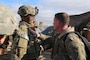 U.S. Army Command Sgt. Maj. William F. Thetford, U.S. Central Command senior enlisted leader, presents coins to soldiers during a training exercise in Iraq, Jan. 16, 2019. The 3rd Cav. Regt. is deployed in support of Operation Inherent Resolve, working by, with and through the Iraqi Security Forces and Coalition partners to defeat ISIS in areas of Iraq and Syria. ( U.S. Army photo by Sgt. Franklin Moore)