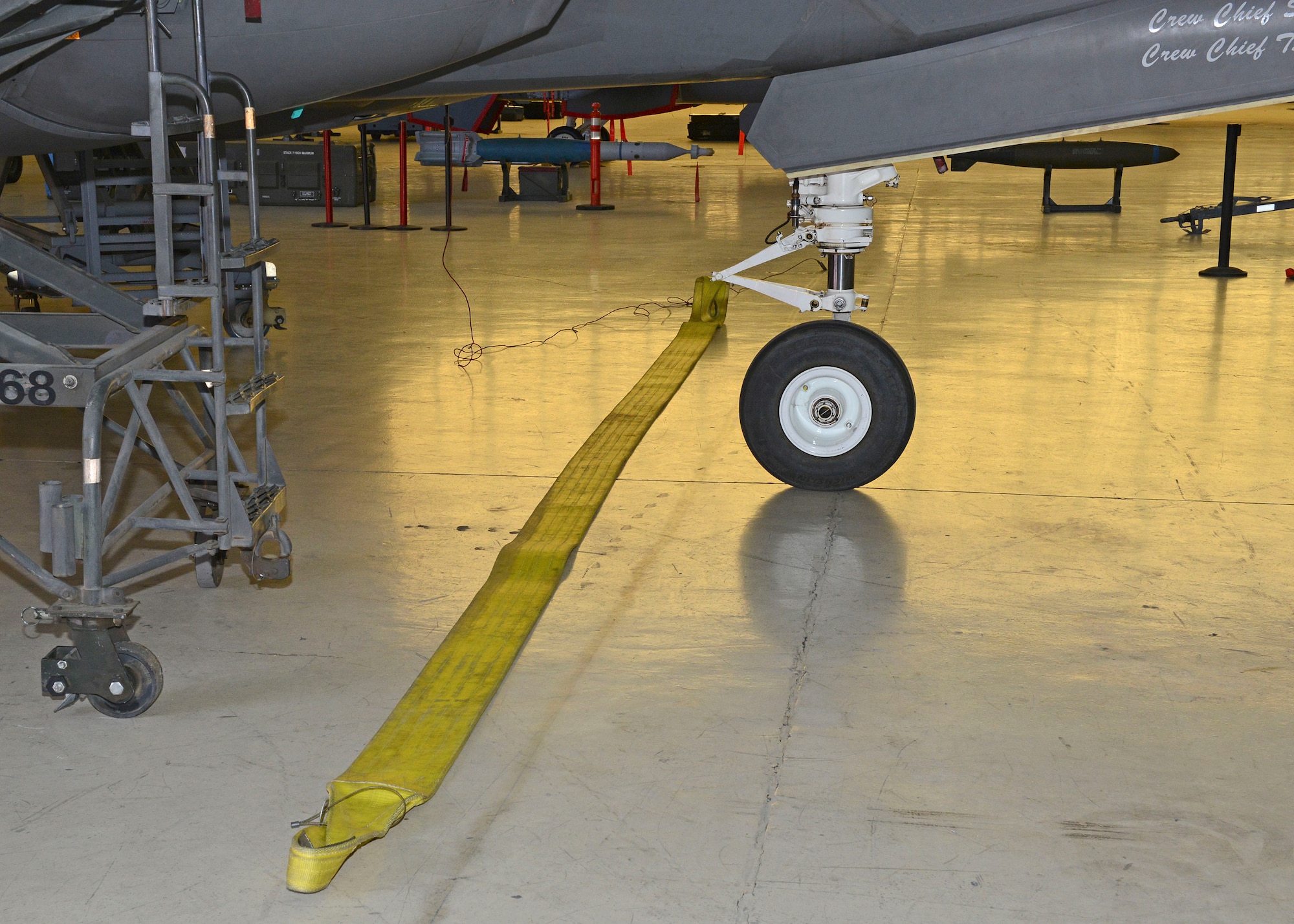 A strap that is placed underneath an F-35 and then attached to a crane is one of the methods a test team verified to recover a crashed or disabled F-35 Dec. 12, 2018. (U.S. Air Force photo by Kenji Thuloweit)