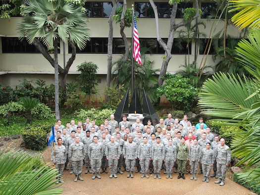 The 17th Operational Weather Squadron (OWS) poses for a group photo at the Pacific Air Forces headquarters building, Joint Base Pearl Harbor-Hickam, Hawaii, May 30, 2018. The 17th OWS was selected as the Air Force Weather Squadron of the Year for 2018. (Courtesy Photo)