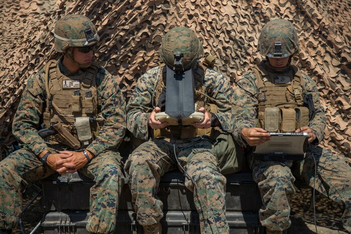 U.S. Marines with the 11th Marine Regiment, 1st Marine Division operate a RQ-20 Puma a small unmanned aircraft system during SUMMER FIREX 2018 at Marine Corps Base Camp Pendleton, Calif., Aug. 8, 2018.