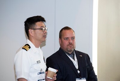 Protocol Officer Richard Bechand stands ready at Suppliers Conference.