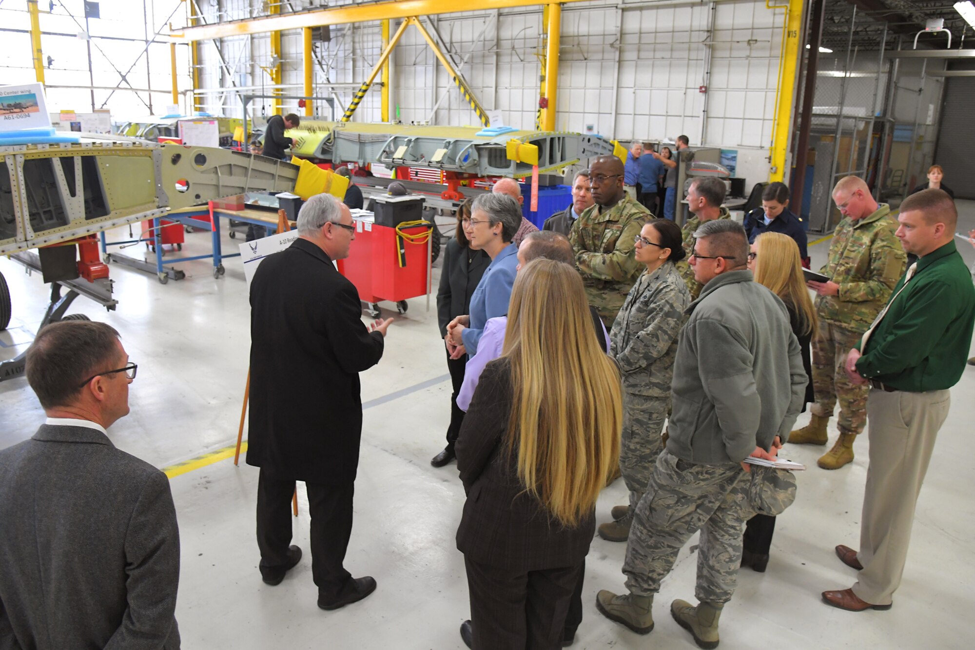 Michael Hackett, A-10 chief Engineer, discusses A-10 Thunderbolt II readiness and sustainment with Air Force Secretary Heather Wilson during a base visit, Jan. 24, 2019, at Hill Air Force Base, Utah. (U.S. Air Force photo by Todd Cromar)
