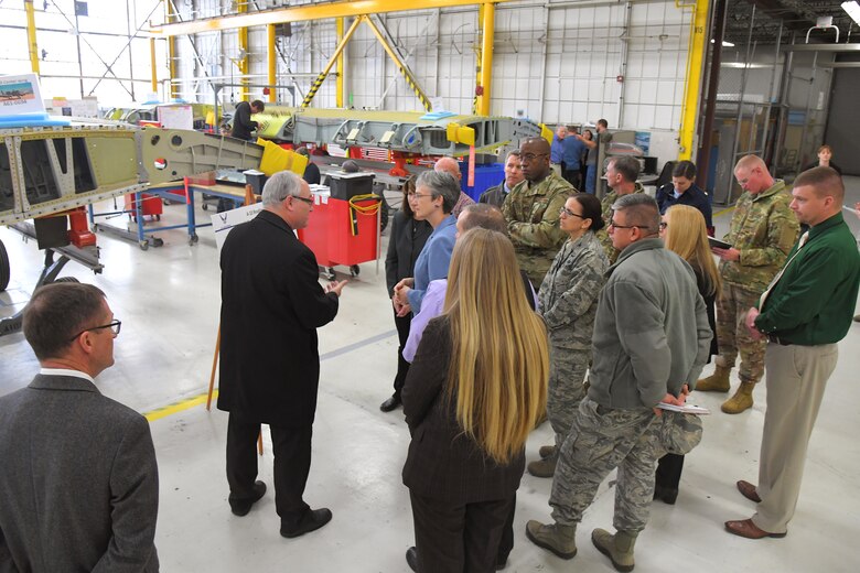 Michael Hackett, A-10 chief Engineer, discusses A-10 Thunderbolt II readiness and sustainment with Air Force Secretary Heather Wilson during a base visit, Jan. 24, 2019, at Hill Air Force Base, Utah. (U.S. Air Force photo by Todd Cromar)