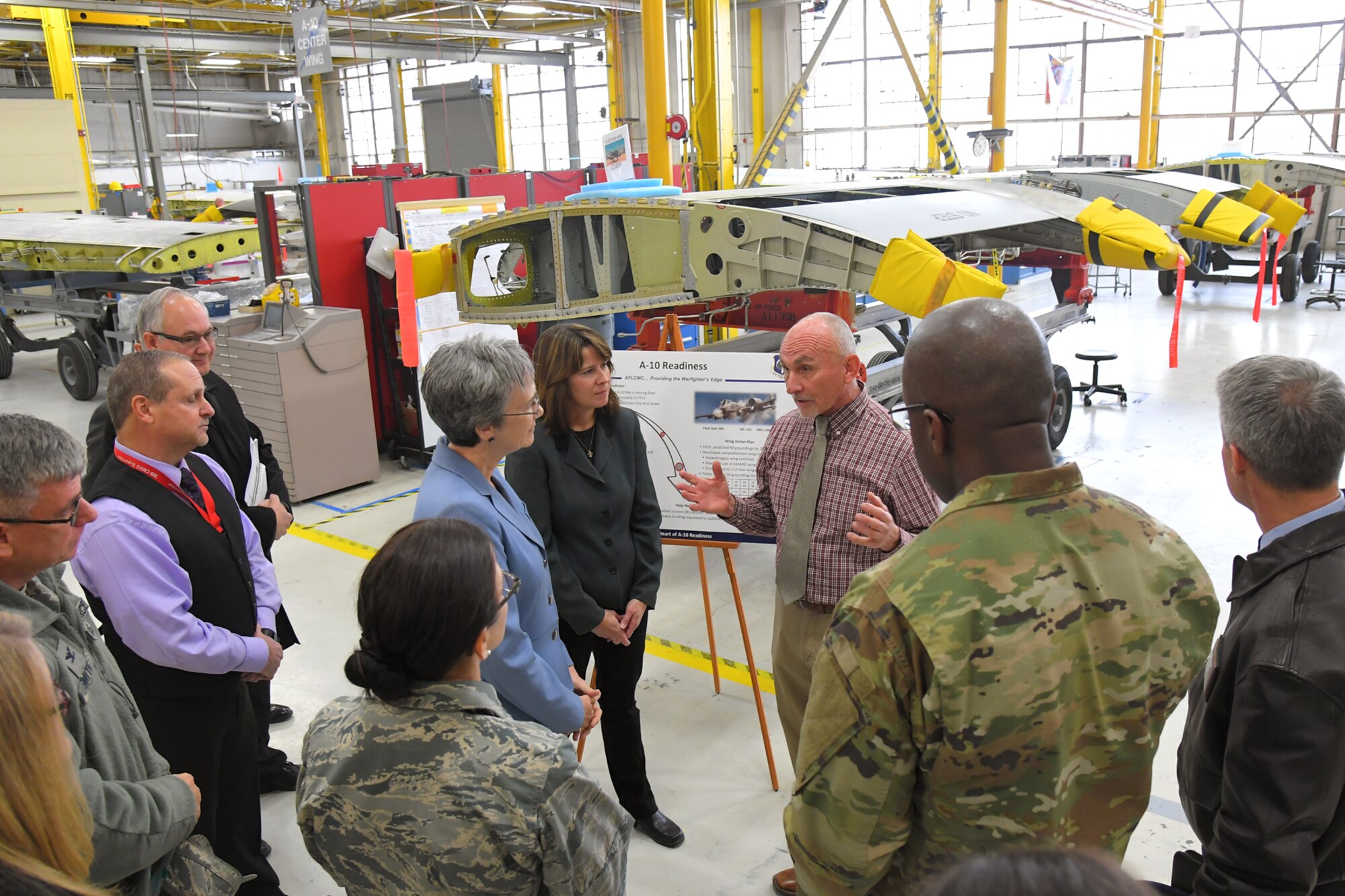 Shane Olsen, 533rd Commodities Maintenance Squadron, discusses A-10 Thunderbolt II readiness and sustainment with Air Force Secretary Heather Wilson during a base visit, Jan. 24, 2019, at Hill Air Force Base, Utah. (U.S. Air Force photo by Todd Cromar)