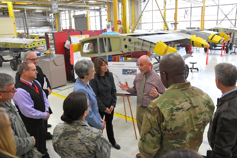 Shane Olsen, 533rd Commodities Maintenance Squadron, discusses A-10 Thunderbolt II readiness and sustainment with Air Force Secretary Heather Wilson during a base visit, Jan. 24, 2019, at Hill Air Force Base, Utah. (U.S. Air Force photo by Todd Cromar)