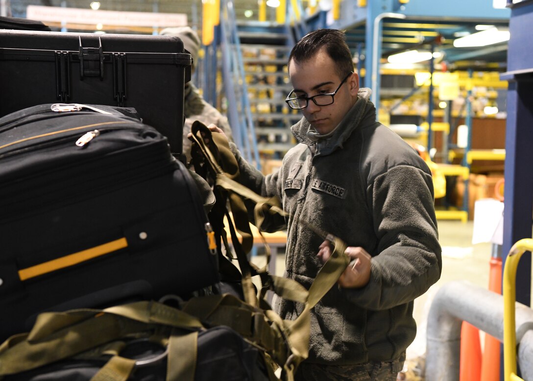 104th Logistics Readiness Squadron Airmen prepare to load cargo for a Temporary Duty Assignment Jan. 22, 2019, at Barnes Air National Guard Base, Massachusetts. The Airmen are going to Patrick Air Force Base where they will train to help them prepare for various situations.  (U.S. Air National Guard photos by Airman Sara Kolinski)