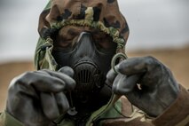 U.S. Marine Corps Cpl. Ramon Trevino, an infantry Marine with 1st Battalion, 5th Marine Regiment, participates in a decontamination drill during Steel Knight 2019 (SK19) on Marine Corps Air Ground Combat Center, Twentynine Palms, Calif., Dec. 06, 2018.