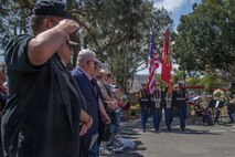 U.S. Marine Corps Veterans salute during the 5th Marines Vietnam War Memorial unveiling ceremony in the Camp San Mateo Memorial Garden at Marine Corps Base Camp Pendleton, Calif., May 28, 2018.