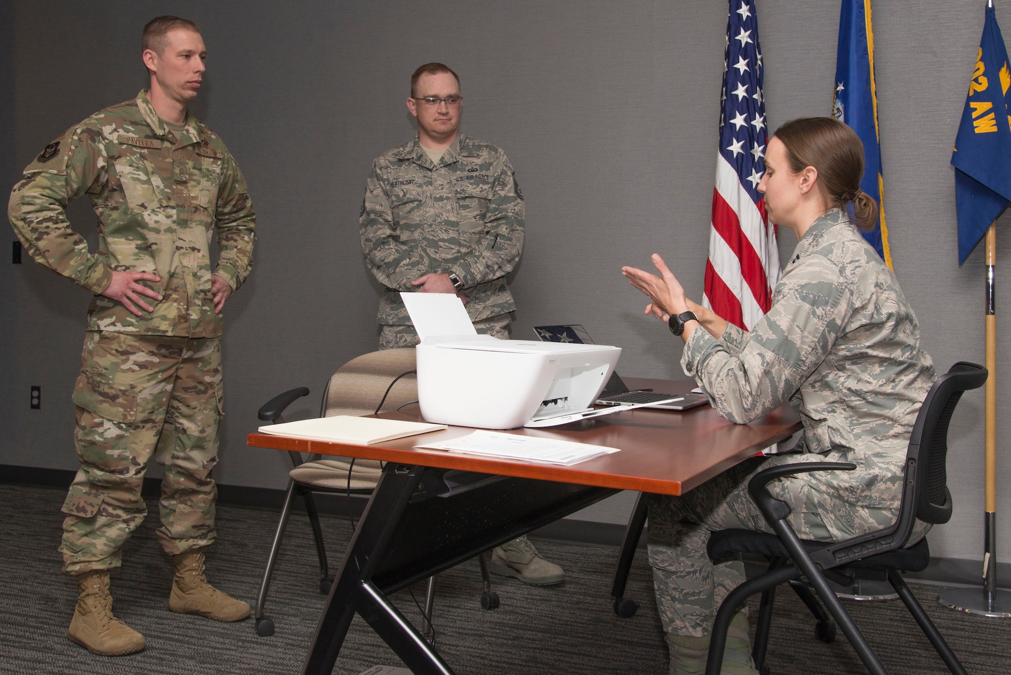 From left, Master Sgt. Jesse Pavelka, 8th Space Warning Squadron, Master Sgt. Scott Heathcoat, 310th Space Wing and Capt. Erin Couitt, 310th SW Mission Support Group, simulate a first sergeant scenario during an Air Force Reserve Additional Duty First Sergeant Symposium, Jan. 15, 2019, at Peterson Air Force Base, Colorado.