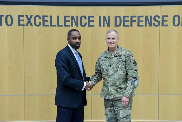 Defense Intelligence Agency Director Lt. Gen. Robert P. Ashley, Jr., right, thanks WTOP radio National Security Correspondent J.J. Green for speaking to the DIA workforce during a DIA Mentoring Summit, Jan. 17, 2019, at the DIA headquarters.