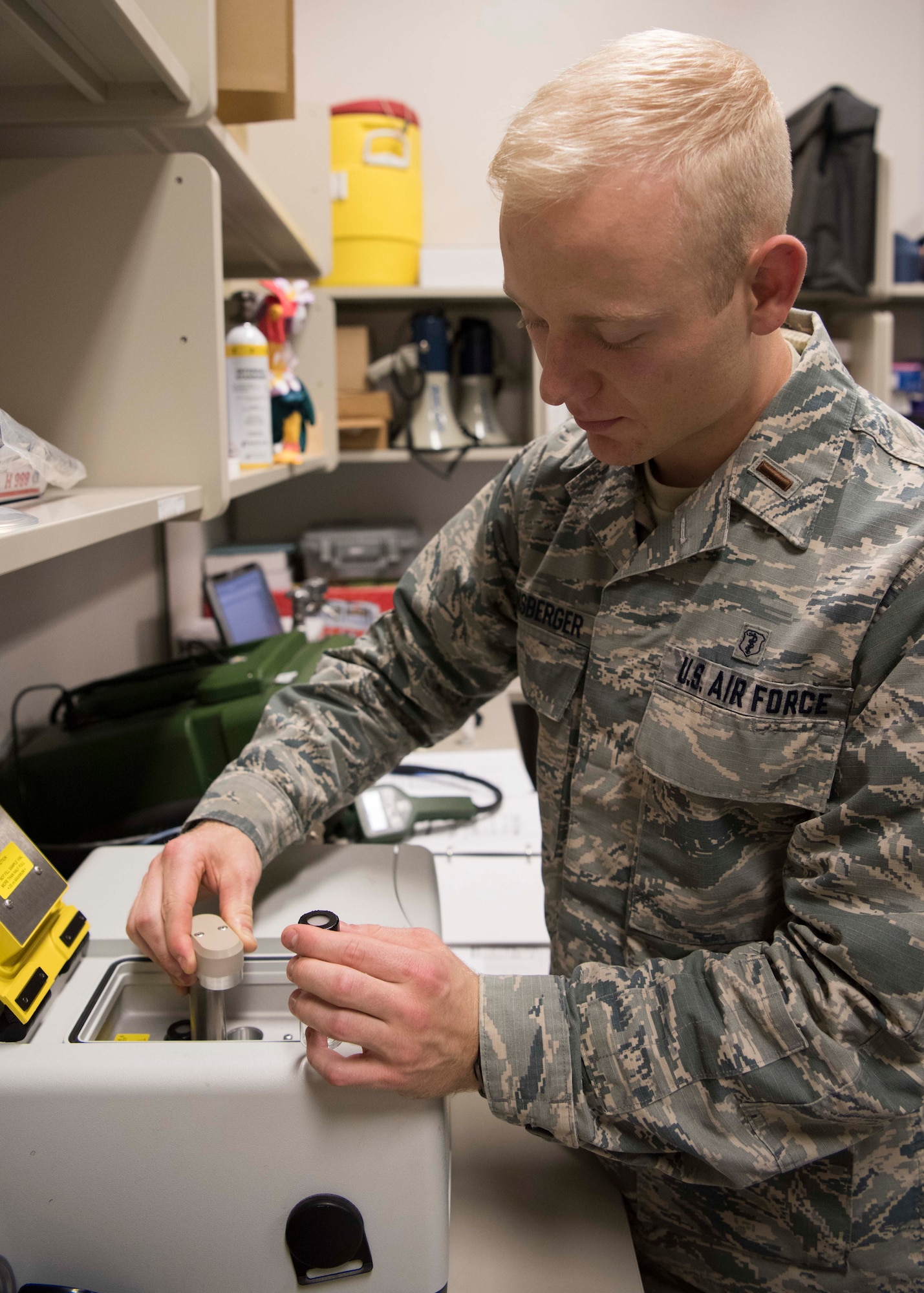 2nd Lt. Connor Mansberger, 49th Medical Group Bioenvironmental Engineering chief of operations, inserts a sample vile into a HAPSITE chemical identification system, Jan. 11, 2019, on Holloman Air Force Base, N.M. The HAPSITE analyzes the components of liquid and air samples, and bioenvironmental engineers use the device to detect industrial contaminants during work center inspections. (U.S. Air Force photo by Staff Sgt. BreeAnn Sachs)