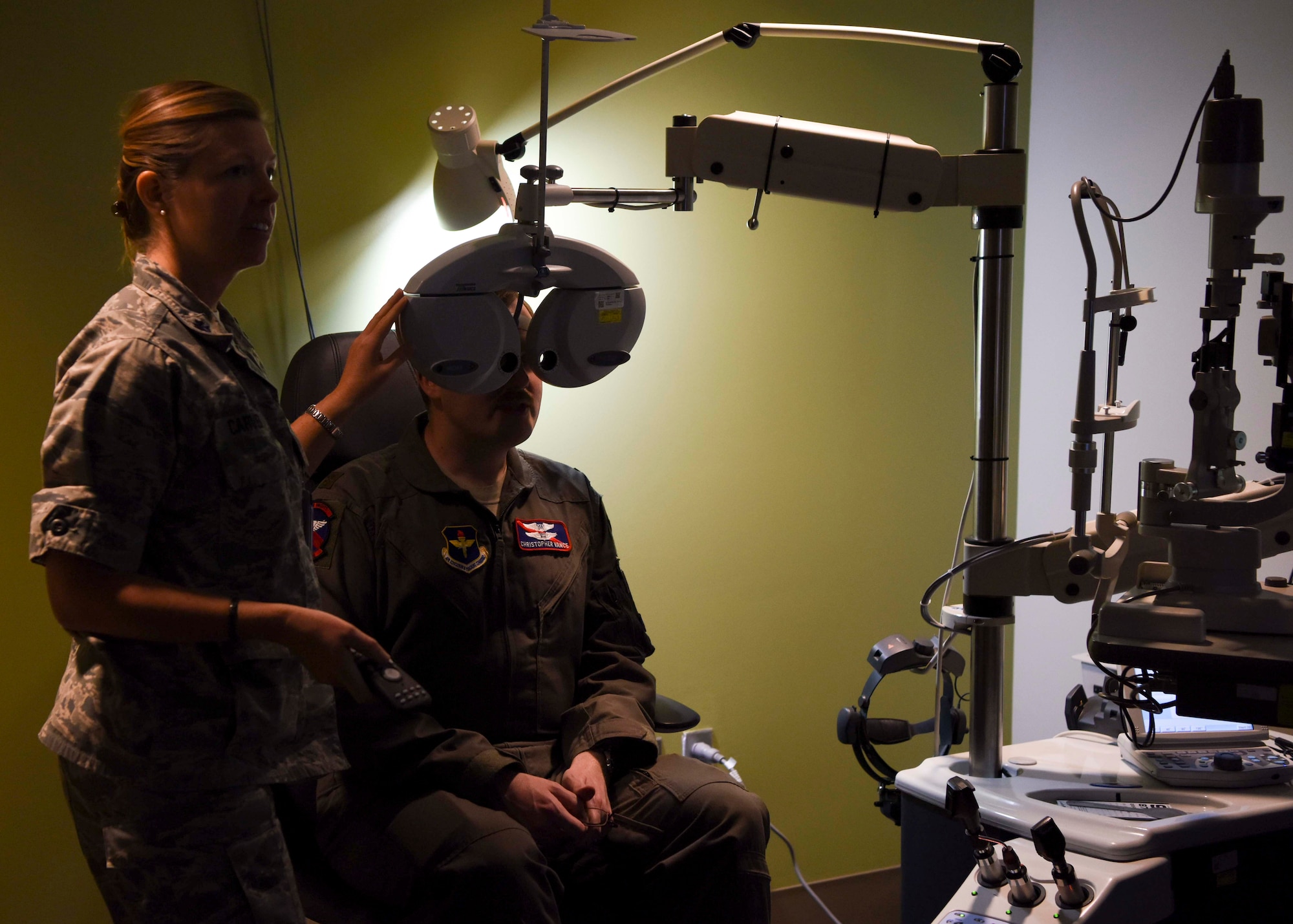 Lt. Col. Jennifer Carver, 49th Medical Group optometrist, conducts a vision exam for Maj. Christopher Vance, 9th Attack Squadron instructor pilot, Jan. 23, 2019, on Holloman Air Force Base, N.M. The 49th MDG Optometry Clinic’s primary mission is to perform annual eye exams for the base community, as well as screenings for diabetics and fittings for glasses and contact lenses. (U.S. Air Force photo by Staff Sgt. BreeAnn Sachs)