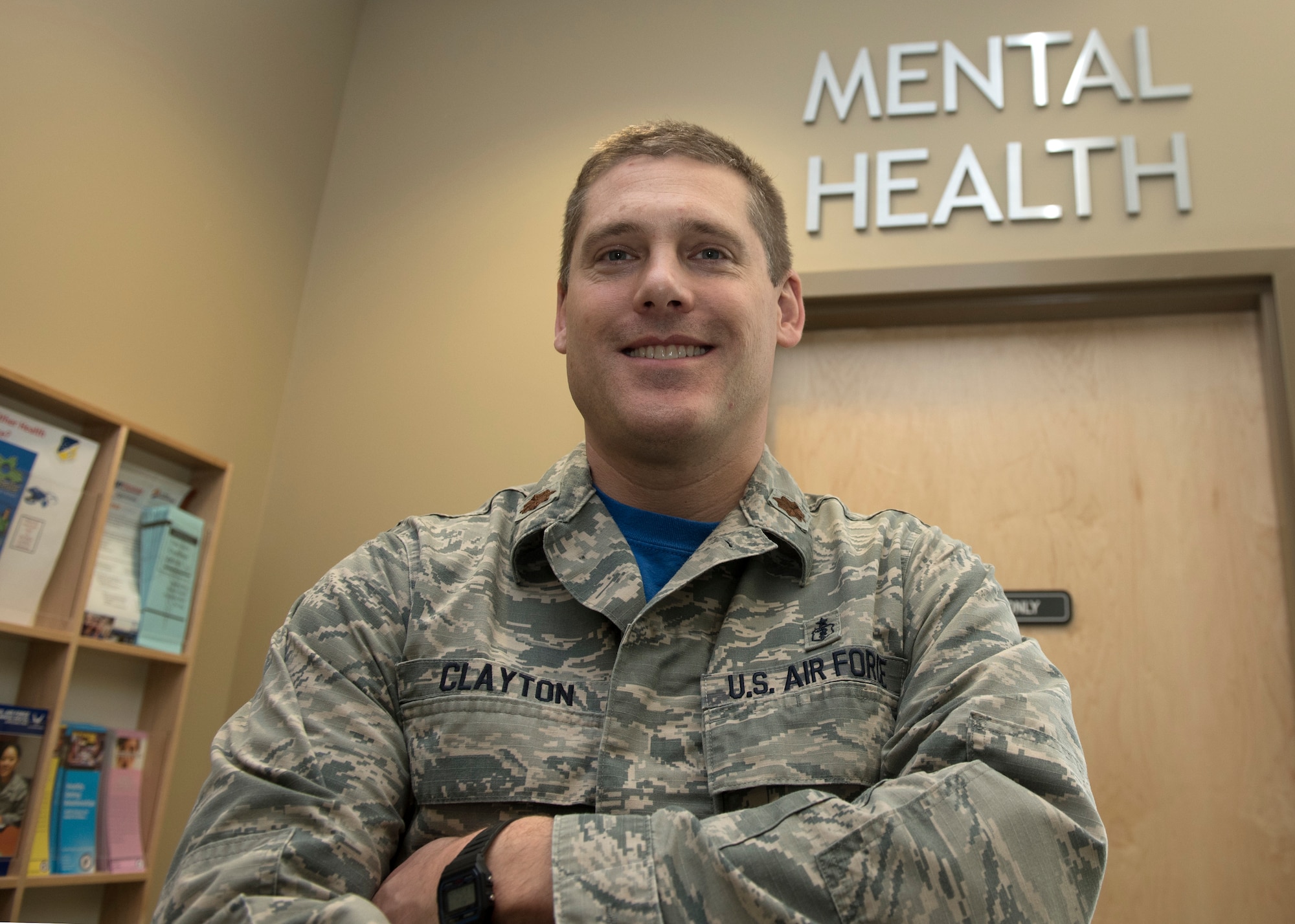 Maj. Spencer Clayton, 49th MDG Mental Health flight commander, poses outside the Mental Health clinic, Jan. 14, 2019, on Holloman Air Force Base, N.M. Mental Health staff are responsible for the overall mental well-being of Airmen across the base, and they work to keep Airmen fit to complete the mission, as well as live a happy life. (U.S. Air Force photo by Staff Sgt. Timothy Young)