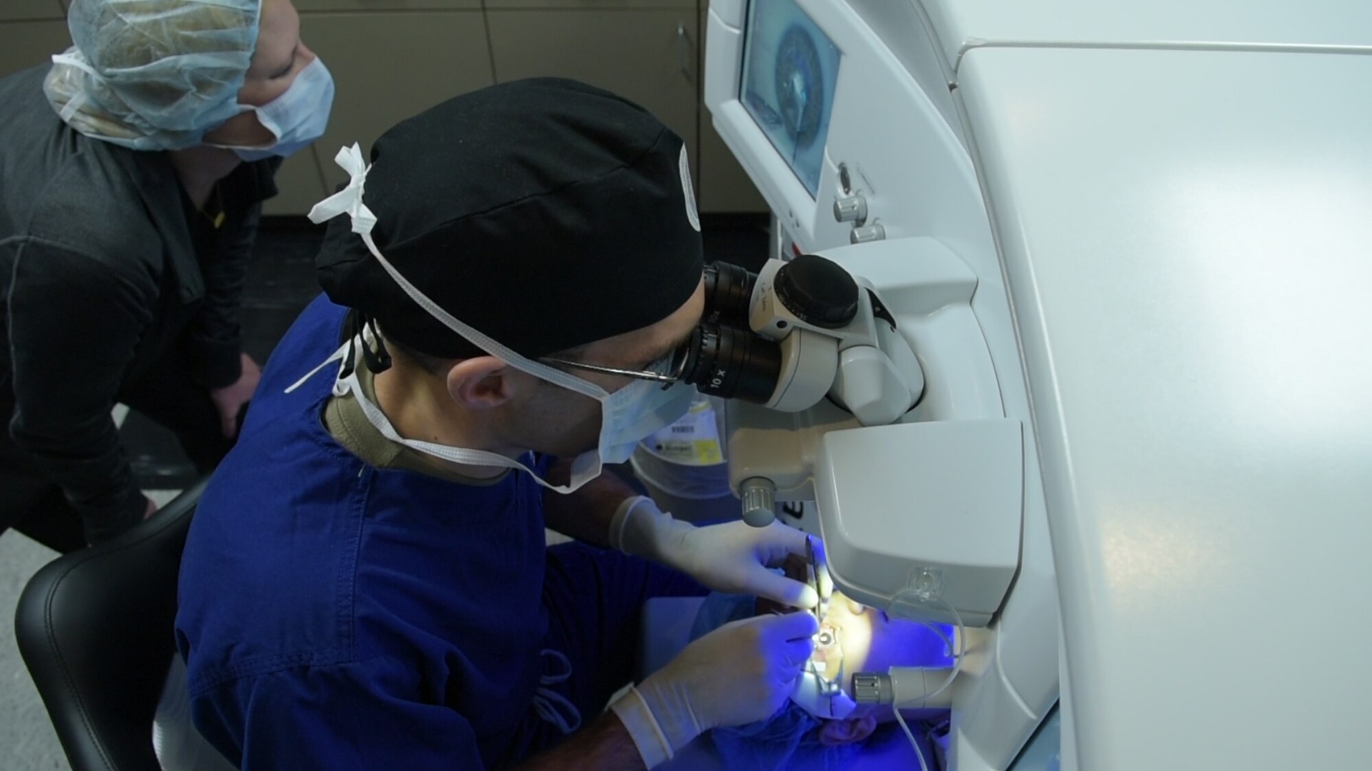 Army Maj. (Dr.) Gary Legault, 59th Medical Wing ophthalmologist performs small incision lenticule extraction treatment at the Joint Warfighter Refractive Surgery Center, Wilford Hall Ambulatory Surgical Center, Jan. 15, 2019.  SMILE treatment is one of three laser surgeries performed to enhance a warfighter's vision. Surgeons at WHASC Joint Warfighter Refractive Surgery Center executed the center's 50,000th surgery since its opening in 2000. (U.S. Air Force photo by Airman 1st Class Ryan Mancuso)