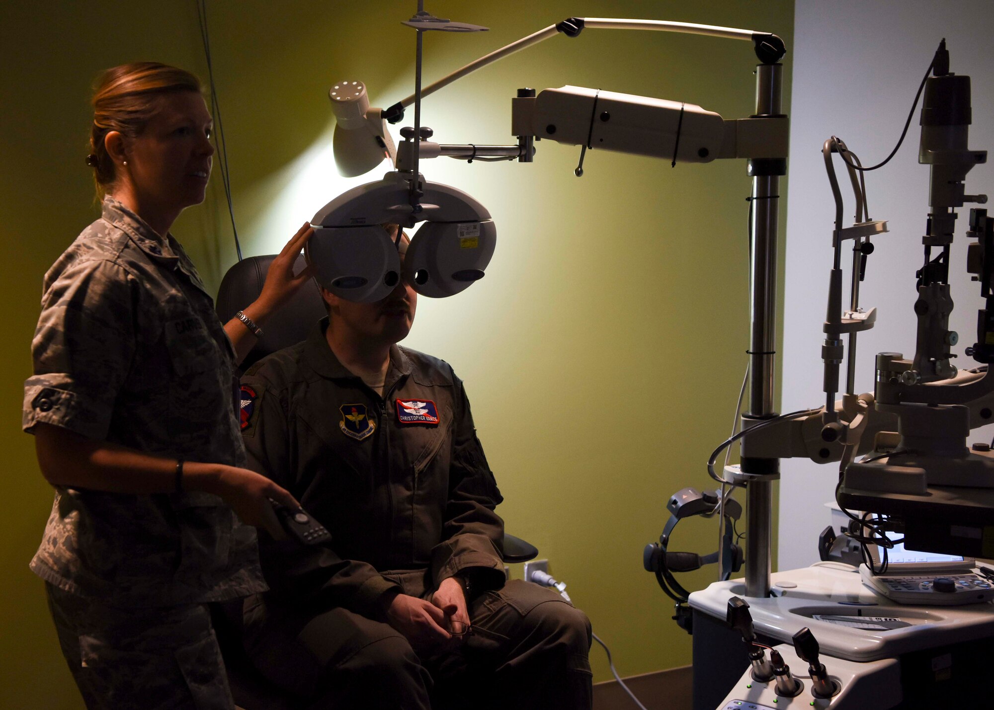 U.S. Air Force Lt. Col. Jennifer Carver, 49th Medical Group optometrist, conducts a vision exam for Maj. Christopher Vance, 9th Attack Squadron instructor pilot, at Holloman Air Force Base, N.M., Jan. 23, 2019. The 49th MDG Optometry Clinic’s primary mission is to perform annual eye exams for the base community, as well as screenings for diabetics and fittings for glasses and contact lenses. (U.S. Air Force photo by Staff Sgt. BreeAnn Sachs)