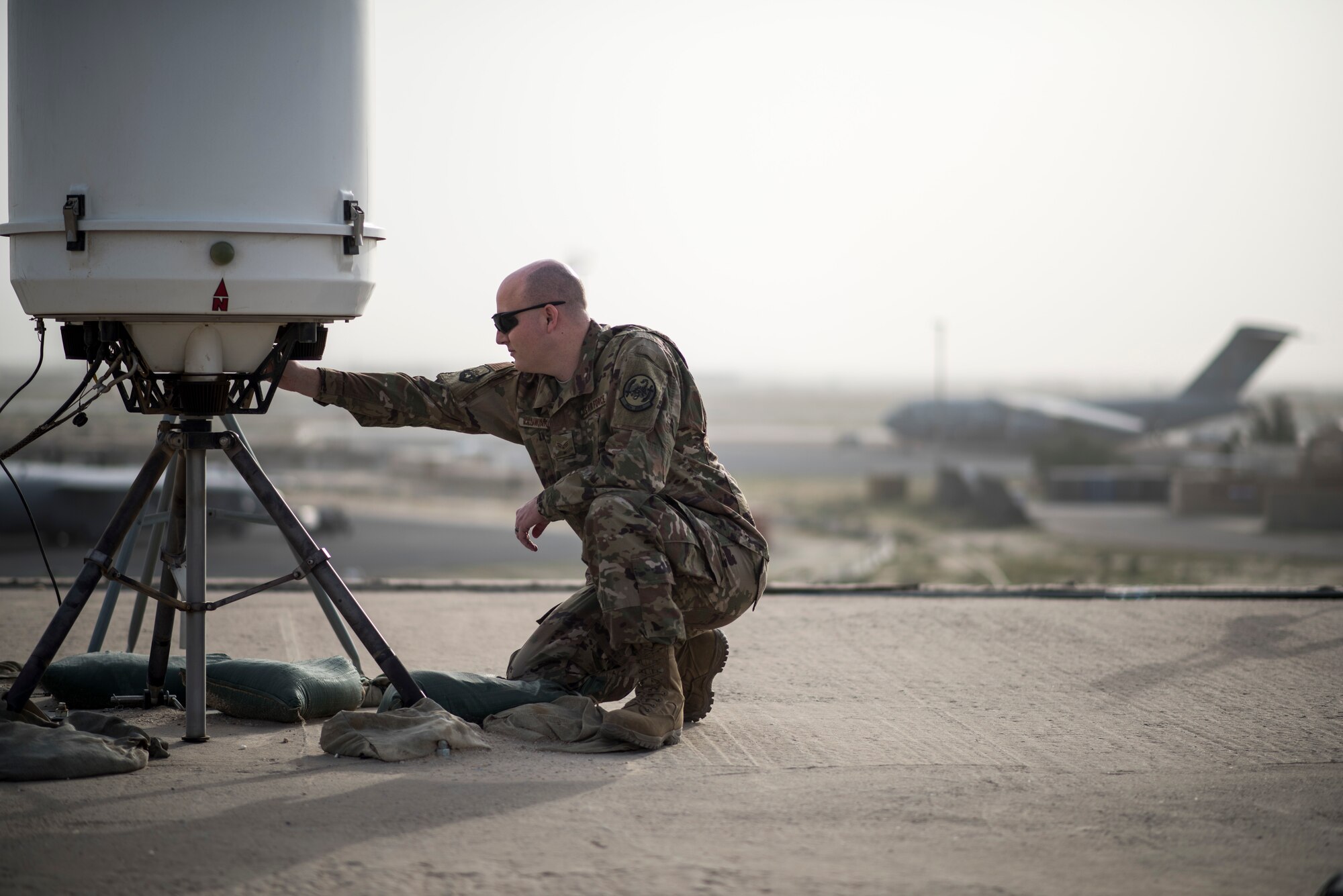 Senior Airman Joshua Vanwinkle, 386th Expeditionary Operation Support Squadron weather forecaster, checks over a weather radar at an undisclosed location in Southwest Asia, Jan. 25, 2019. As a weather expert, he utilizes the latest technology to predict weather patterns, prepare forecasts and communicate weather information to commanders and pilots so that every mission goes as planned