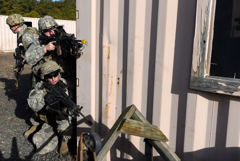 Soldiers assigned to the 2-325th Airborne Infantry Regiment Fort Bragg, North Carolina practice clearing zones during their cold-weather gunnery qualification training on Joint Base McGuire-Dix-Lakehurst, New Jersey, Jan. 17, 2019. The Soldiers moved in squads, searching for enemies and making sure each room of the compound was safe to enter. (U.S. Air Force photo by Airman 1st Class Ariel Owings)