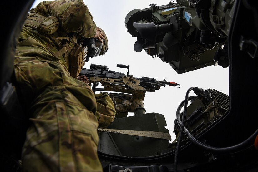 A Soldier with the 2-325th Airborne Infantry Regiment prepares his weapon during the live-fire portion of the cold-weather gunnery qualification training on Joint Base McGuire-Dix-Lakehurst, New Jersey, Jan. 17, 2019. The objective of the training was to locate their target and infiltrate the compound. (U.S. Air Force photo by Airman 1st Class Ariel Owings)