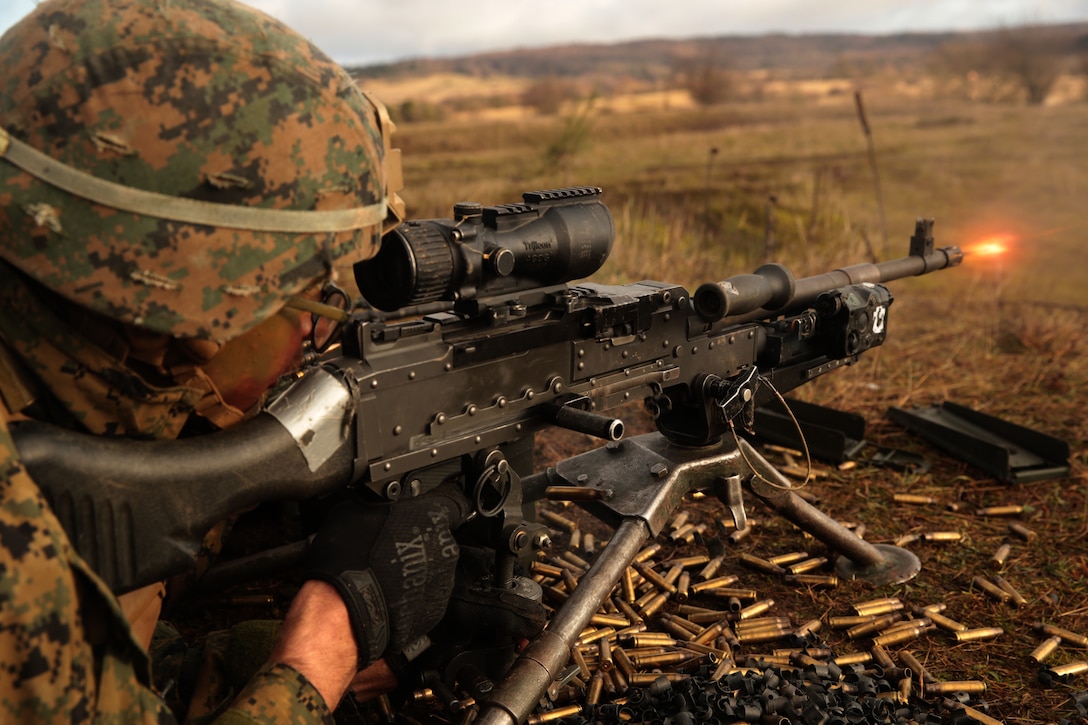A U.S. Marine with Special Purpose Marine Air-Ground Task Force- Crisis Response- Africa 19.1 fires a M240B machine gun during a platoon attack on a live-fire range in Baumholder, Germany, Jan. 17, 2019. SPMAGTF-CR-AF is deployed to conduct crisis-response and theater-security operations in Europe and Africa.