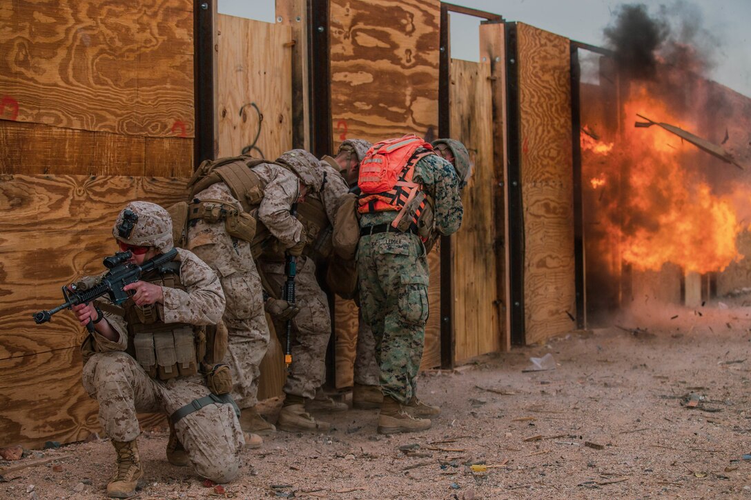 U.S. Marines with Animal Company, 1st Battalion, 7th Marines Regiment, 1st Marine Division , perform a breach and clear exercise at range 220 during Integrated Training Exercise 2-19 aboard the Marine Corps Air Ground Combat Center, Twentynine Palms, Calif., January 20, 2019. The purpose of ITX is to create a challenging, realistic training environment that produces combat-ready forces capable of operating as an integrated Marine Air Ground Task Force.