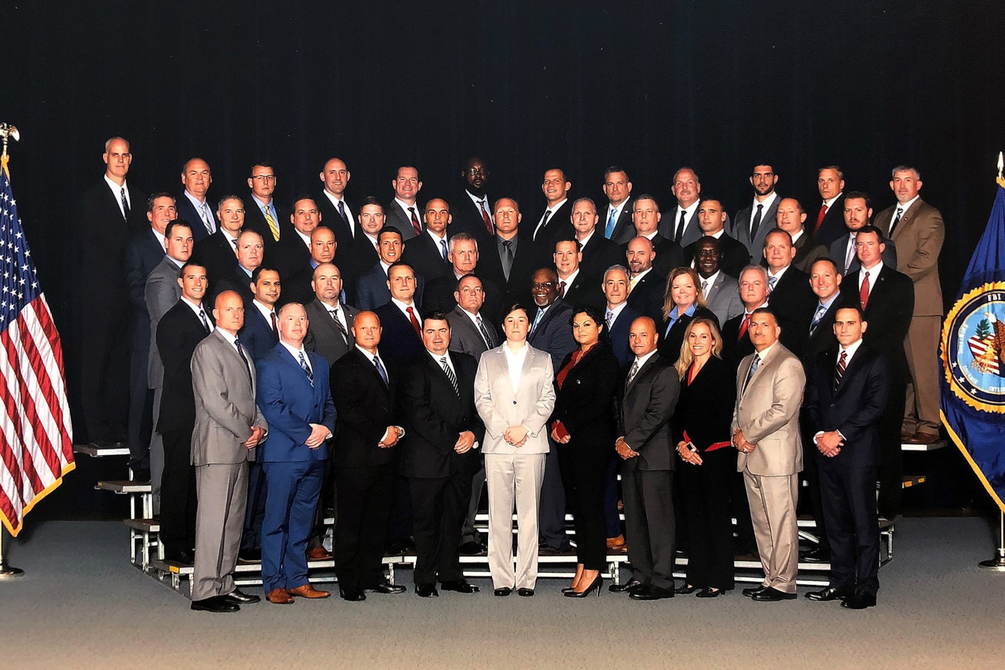 Master Sgt. Elizabeth Rodenhauser, 341st Missile Security Forces Squadron NCO in charge of operations, center, poses for a photo with her graduating class at the FBI National Academy. Rodenhauser graduated the FBINAA December 14, 2018. (Courtesy photo)