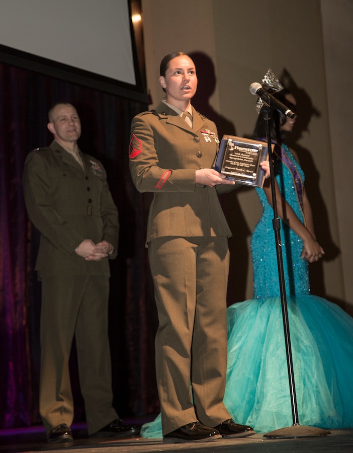 Sgt. Emily Rowe gives her acceptance speech after being recognized as MCLB Barstow's Noncommissioned Officer of the Year during the 38th annual Bastow COmmunity Recognition Awards program Jan. 26. Sgt. Rowe is a stable hand assigned to the Marine Corps Mounted Color Guard and has ridden in more than 30 rodeo and parade events throughout 2018