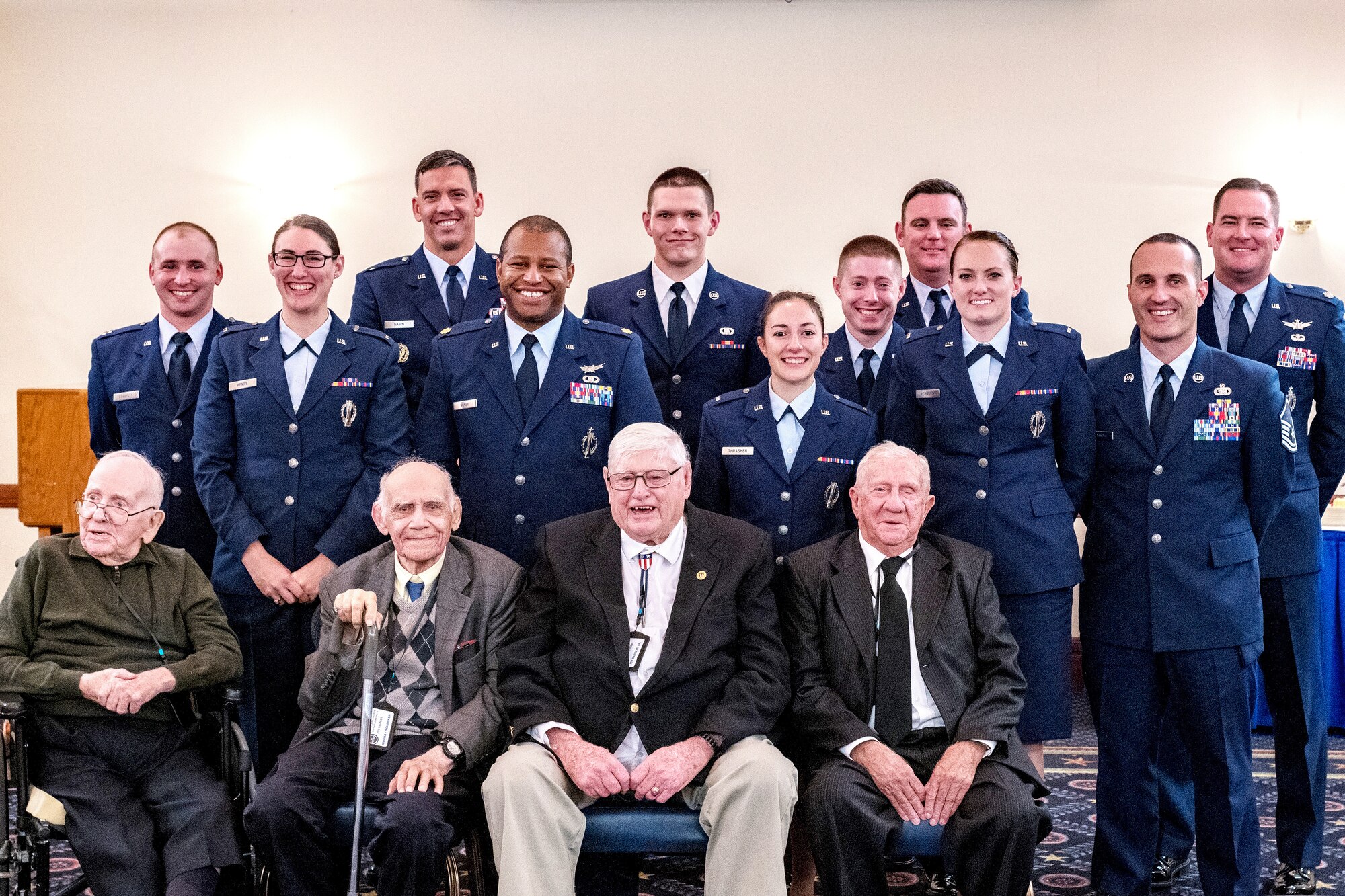 This group photo was taken October 13, 2018 in the officers' lounge at Joint Base Andrews, Maryland, to mark the reunion of the 490th of yesterday and today. From left to right starting in the back are Capt. Tony Ferrelli, Lt. Ariana Henry, Lt. Mitch Nairn, Maj. Chris Boney, Senior Airman Todd Conley, Lt. Kyla Thrasher, Capt. Ryan Potts, Maj. Marc Keller, Lt. Kinsey Richmond, Master Sgt. Matthew Manning, Lt. Col. Troy Stauter. The front row from left to right are retired Maj. Charles Good, retired Staff Sgt. Murry Schenker, Joe Barrett and Tom Bristol. (Photo courtesy Capt. Tony Ferrelli)