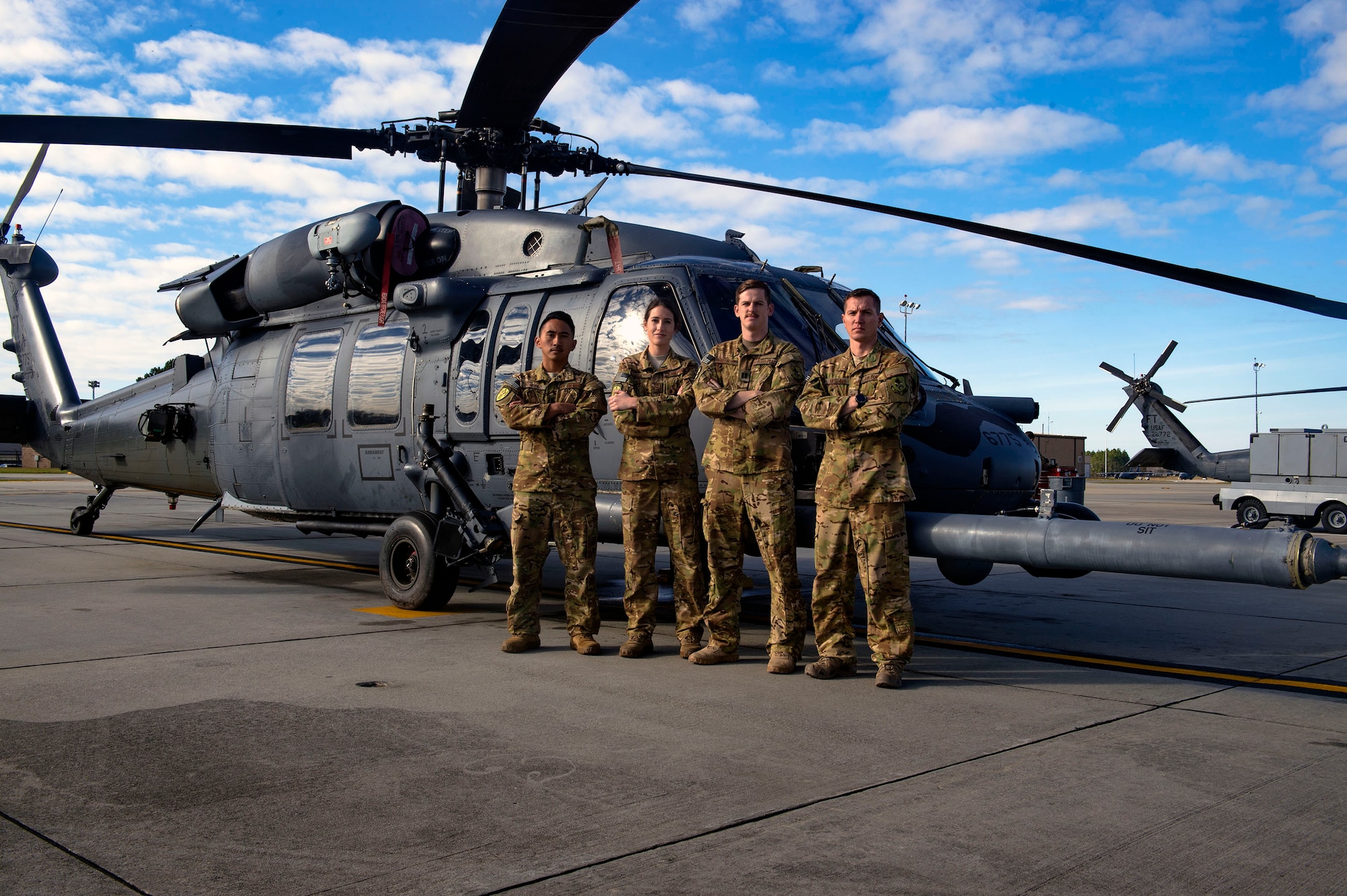 A 41st Rescue Squadron HH-60G Pave Hawk helicopter ‘hard crew’ poses for a photo, Jan. 11, 2019, at Moody Air Force Base, Ga. To optimally perform their Combat Search and Rescue mission downrange, the 347th Rescue Group implemented the advanced training ‘hard crew’ system, which unifies the 38th and 41st RQS’s into separate rescue operator teams that’ll fly every mission together for their upcoming deployment. This concept establishes continuity and chemistry which will help maximize the 38th and 41st RQS’s mission readiness by simultaneously working together to build relationships and understand each other’s idiosyncrasies, strengths, and weaknesses to ultimately improve the team’s performance in mission execution. (U.S. Air Force photo by Senior Airman Greg Nash)