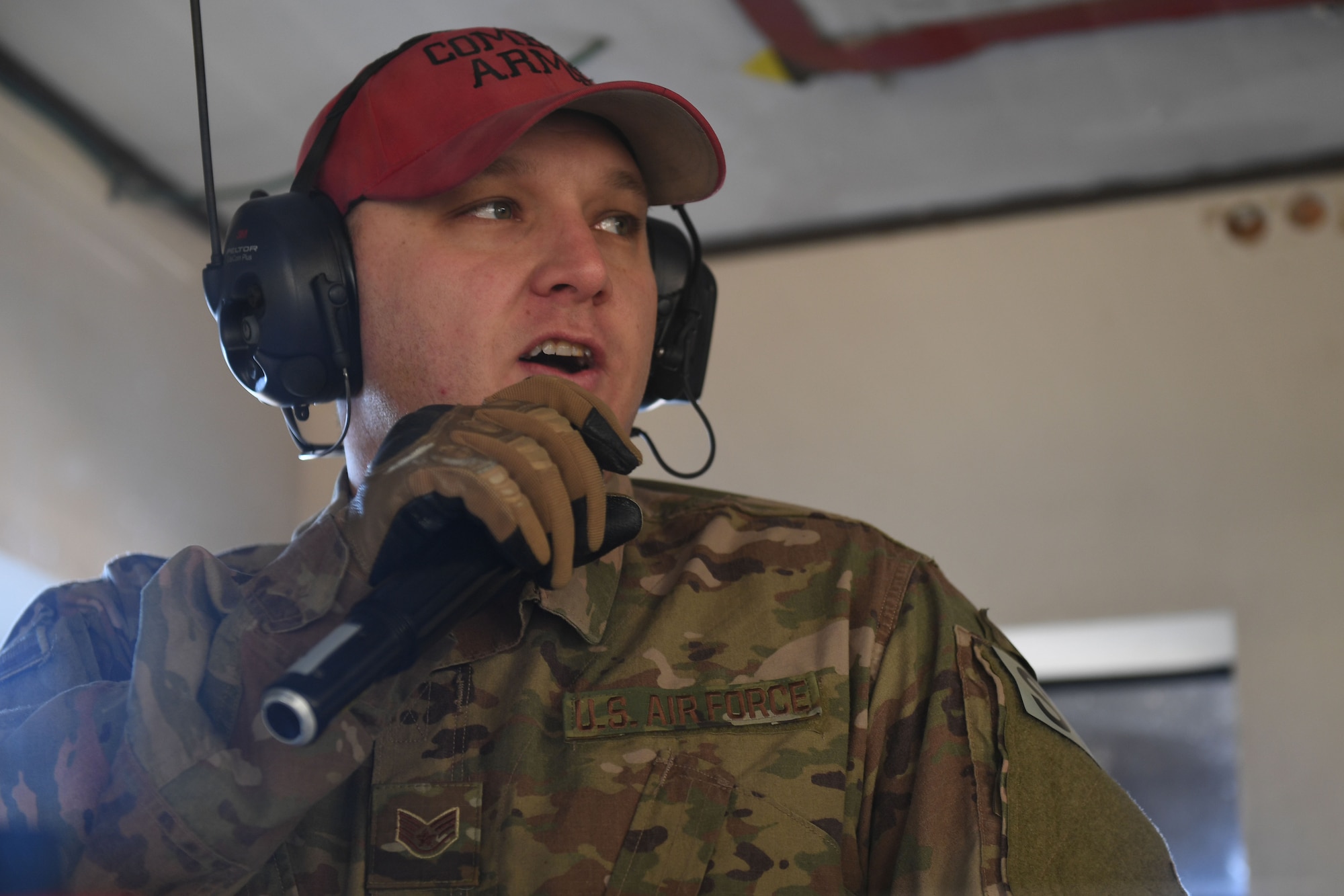 A man speaks into a microphone.