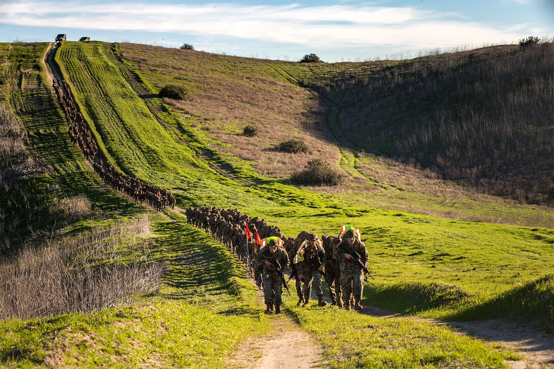 Marines participate in a 6-mile hike.