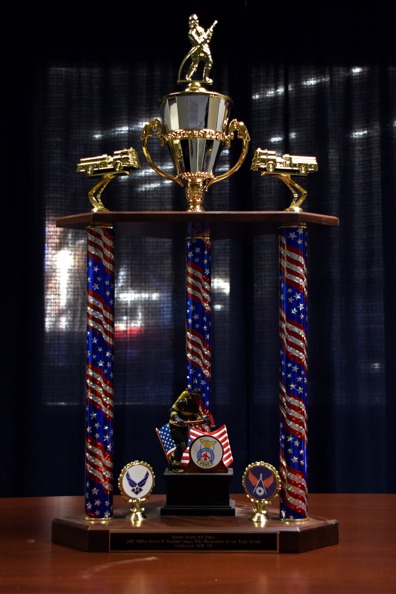 The U.S. Air Force level Small Fire Department of the Year award, from 2017, on display at the Fire Department on Goodfellow Air Force Base, Texas, Jan. 24, 2019. The Fire Department has spent years enhancing on their already high standards to make sure they are providing the best service possible to the base and surrounding community. (U.S. Air Force photo by Airman 1st Class Zachary Chapman/Released)