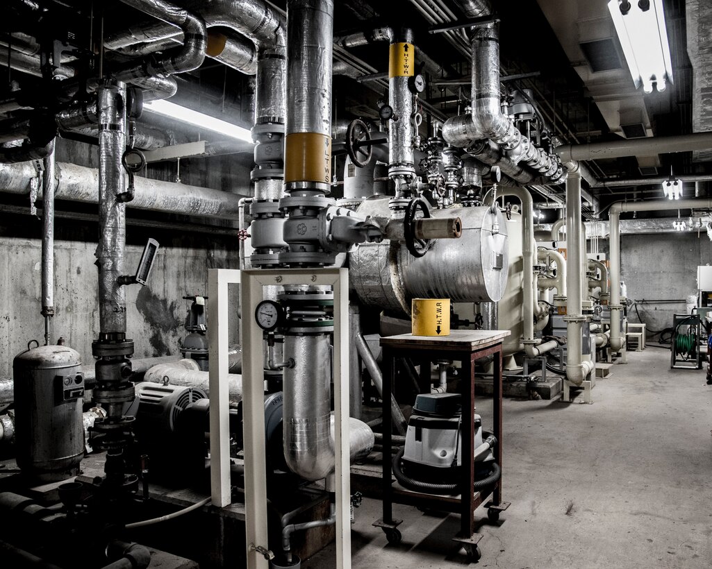 Equipment that keeps the pool operational such as, filters, heaters and a circulation system sit on the basement of the pool at Yokota Air Base, Japan, Jan. 23, 2019. The 374th Civil Engineer Squadron along with contractors have been working to fix damaged equipment, and also to protect them in the future. (U.S. Air Force photo by Machiko Arita)