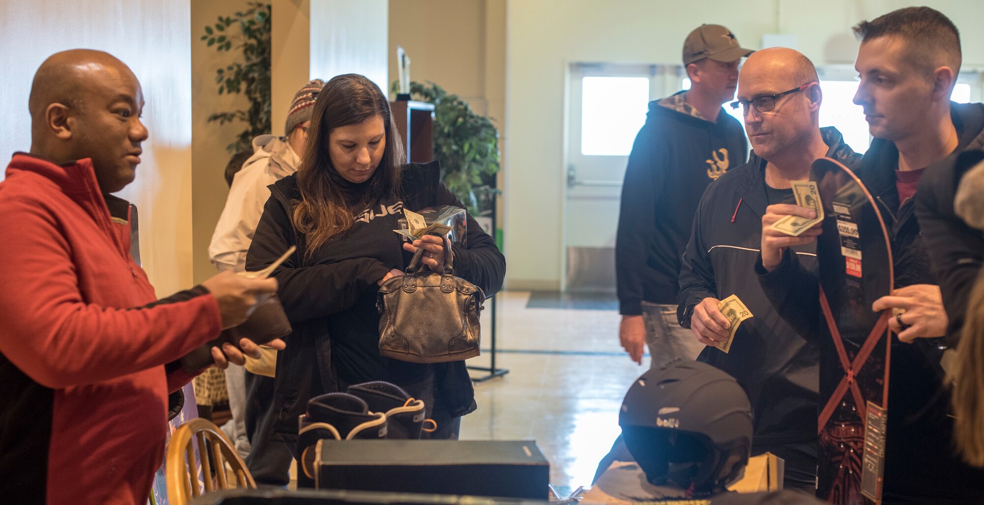 Vendors sell their lightly-used snow gear to interested Team Misawa members at Misawa Air Base, Japan, Jan. 26, 2019. These vendors offer equipment at a lower price to aid individuals in saving money. (U.S. Air Force photo by 1st Lt. Jeremy Garcia)