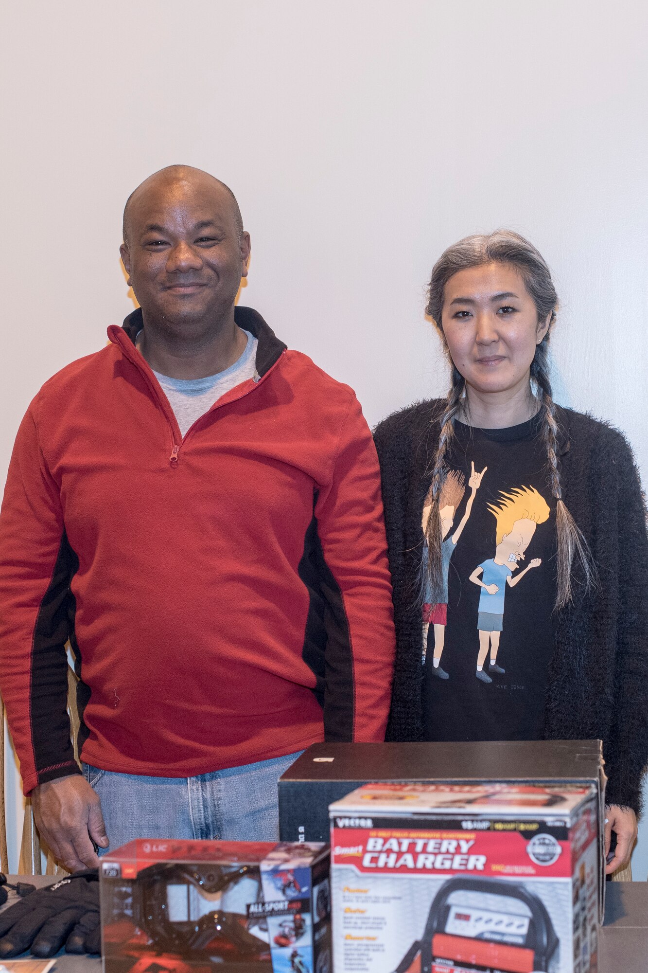 Michael and Yoshie McGlothan, Misawa Team members, participate in the Winter Trade Market as vendors at Misawa Air Base, Japan, Jan. 26, 2019.  The retired military couple sell their snow equipment to pique the interest in snowboarding for other Team Misawa members. (U.S. Air Force photo by 1st Lt. Jeremy Garcia)
