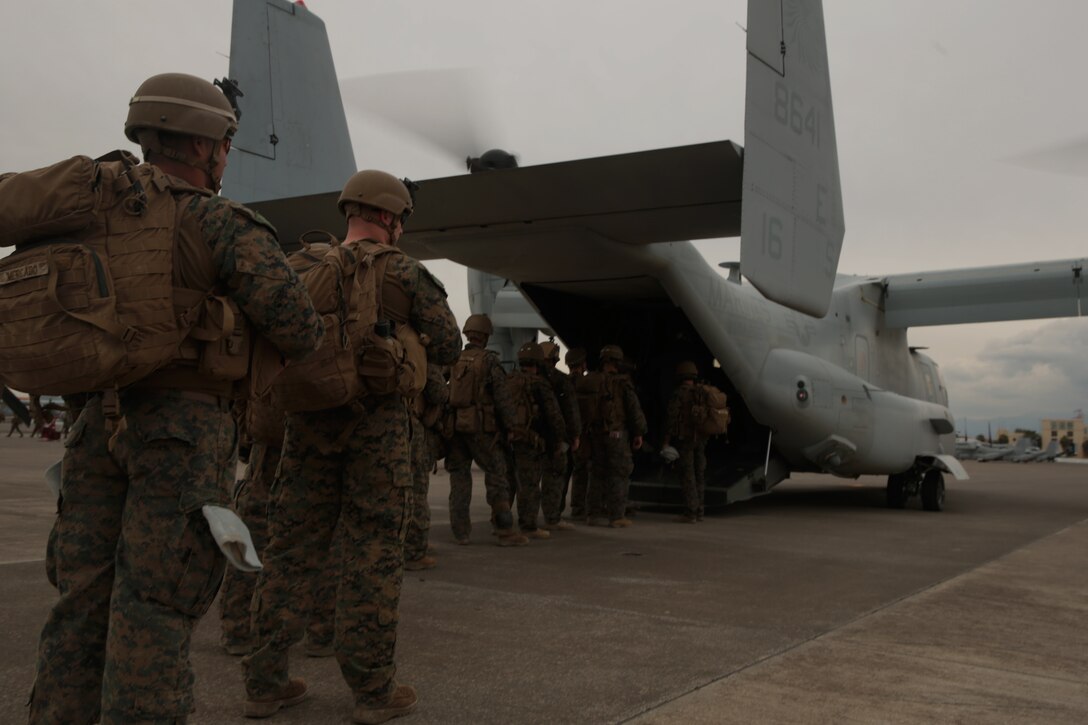 U.S. Marines with Special Purpose Marine Air-Ground Task Force- Crisis Response- Africa 19.1 board a U.S. Marine Corps MV-22 Osprey at Naval Air Station Sigonella, Italy, Jan. 11, 2019