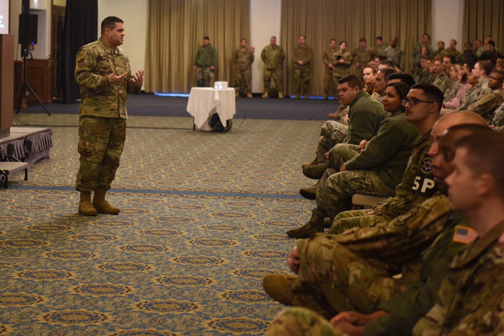 U.S. Air Force Chief Master Sgt. Ernesto Rendon, 86th Airlift Wing command chief master sergeant speaks to Airmen at an all-call on Ramstein Air Base, Germany, Jan. 25, 2019. Rendon spoke about honing leadership within the wing and supporting the people who support their Airmen.