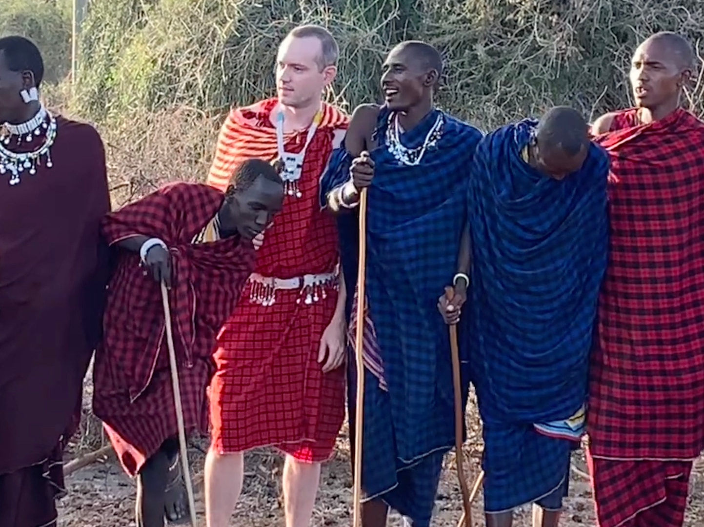 Jeff Crow, material planner in the Defense Logistics Agency Troop Support’s Industrial Hardware supply chain, stands with men from the Maasai tribe during his trip to climb Mount Kilimanjaro in Tanzania December 2018.