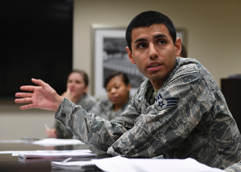 U.S. Air Force Senior Airman Nathaniel Rasmussen, 633rd Aerospace Medicine Squadron periodic health assessment NCO in charge, shares his idea with fellow Medical Right Start Program working group members at Joint Base Langley-Eustis, Virginia, Jan. 23, 2019.