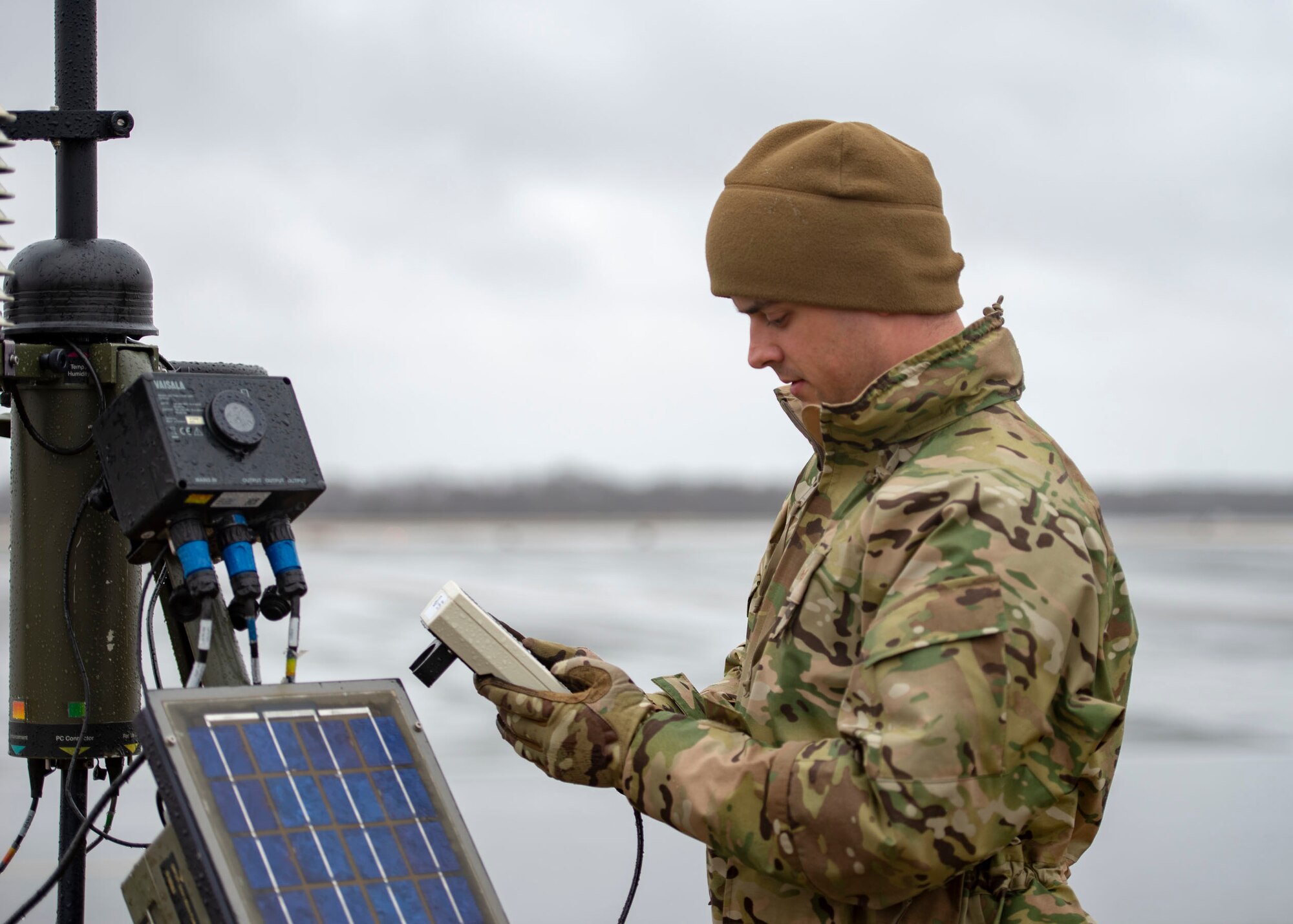 Senior Airman Aaron Cathey, 436th Operations Support Squadron weather forecaster, checks data on a tactical meteorological observation system Jan. 24, 2019, on Dover Air Force Base, Delaware. The equipment provides redundancy for stationary equipment around the runway and is also capable of being used in a deployed environment. (U.S. Air Force photo by Staff Sgt. Jared Duhon)