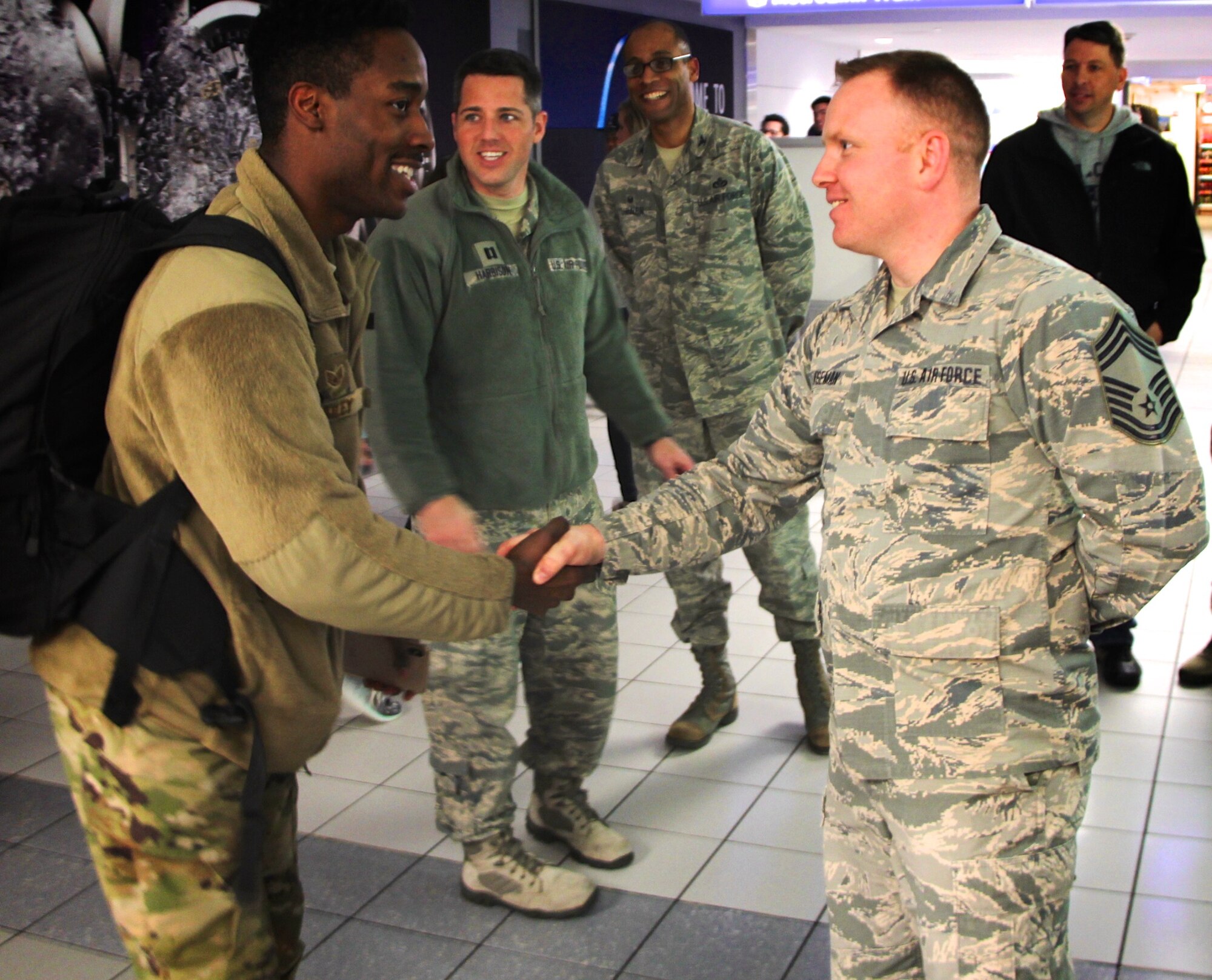 932nd Airlift Wing members welcomed back several Airmen recently, including deployer Staff Sgt. Excel Bailey.  Shaking his hand upon arrival back in Illinois on January 14, 2019, is Chief Master Sgt. Darren Wiseman of the unit's 932nd Inspector General Inspections office.  The 932nd AW is an Air Force Reserve Command unit located at Scott Air Force Base, Illinois.
(U.S. Air Force photo by Lt. Col Stan Paregien)