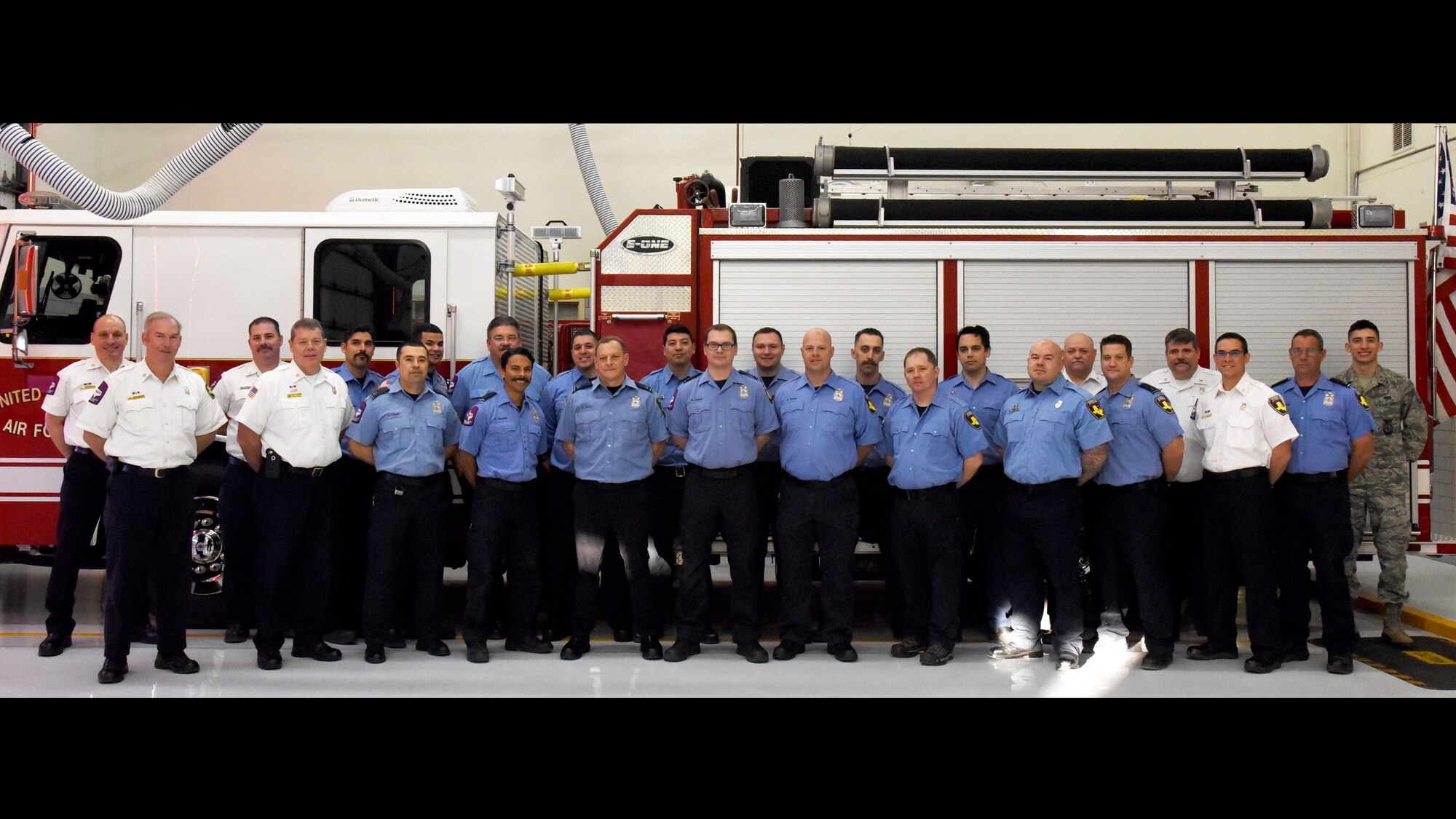 Members from Goodfellow’s Fire Department stand together for a photo in the fire house on Goodfellow Air Force Base, Texas, Jan. 24, 2019. The Fire Department has won several awards for their pursuit of excellence, including the Small Fire Department of the Year award from the U.S. Air Force in 2017. (U.S. Air Force photo by Airman 1st Class Abbey Rieves/Released)