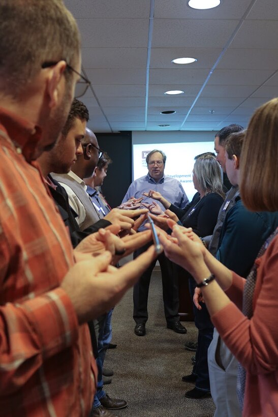 Savannah District Leadership Development Program members participate in a team building exercise facilitated by Dr. Michael Evans of Evans and Associates Consulting Firm.