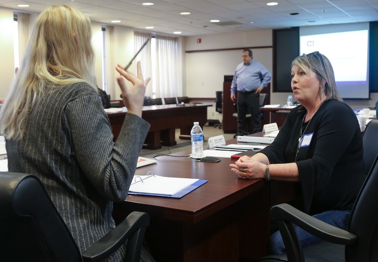 Savannah District Leadership Development Program Level 1 participants Heather Pacheco (left), Equal Employment Office, and Amy Capwell, Real Estate Division, engage in a discussion during one of the training breakout sessions.