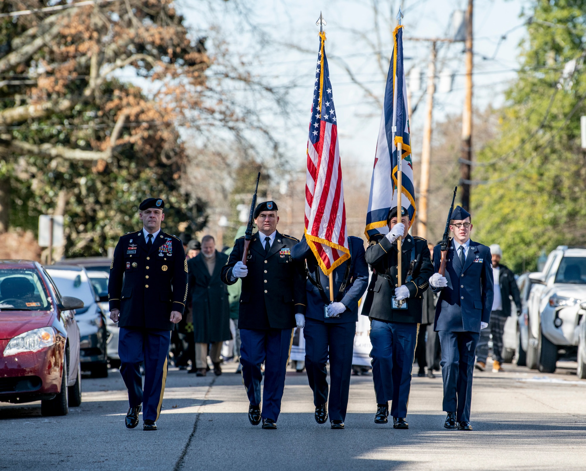 West Virginia National Guard Senior Enlisted Leader, Command Sgt. Maj. Phillip Cantrell, marches beside the joint color guard Jan. 21, 2019, during the Dr. Martin Luther King, Jr., memorial march in Charleston, W.Va. Cantrell will formally assume the responsibilities as State Senior Enlisted Leader on Feb. 2, 2019, during a change of responsibility ceremony at the West Virginia National Guard Joint Forces Headquarters in Charleston. (U.S. Army National Guard photo by Bo Wriston)