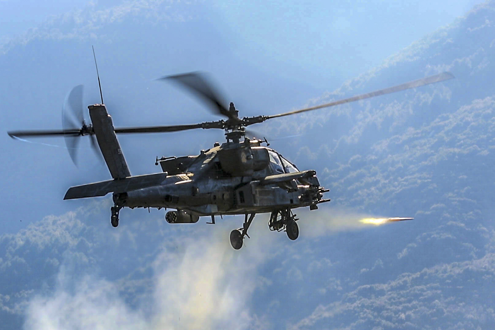 apache helicopter firing rockets